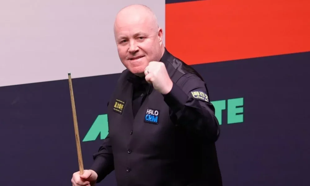 John Higgins is through to the World Snooker Championship semi-finals