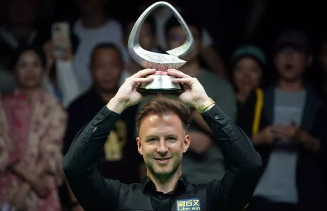 Judd Trump with the 2026 Shanghai Masters trophy